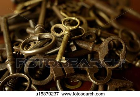 Stack of rusted keys, close up View Large Photo Image Stock Photo - Stack of rusted keys, close up. Fotosearch