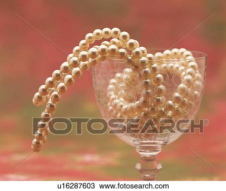String of pearls in glass, close up View Large Photo Image Stock Image - String of pearls in glass, close up. Fotosearch