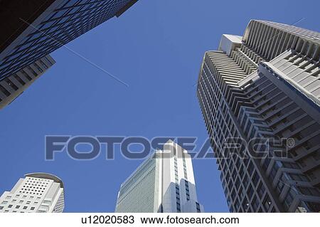 Stock Image - Tall Buildings and Blue Sky. Fotosearch