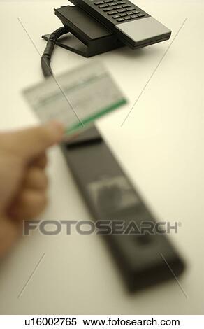 Telephone and Hand Holding Business Card View Large Photo Image Stock Photography - Telephone and Hand Holding Business Card. Fotosearch