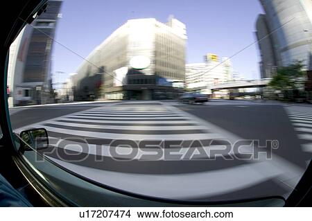 Picture - The view from car window, blurred motion, fish-eye lens, Tokyo prefecture, Japan. Fotosearch