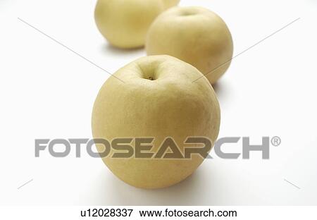 Stock Photo - Three Pears Placed in Line. Fotosearch
