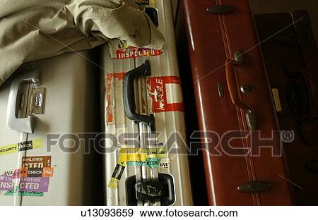 Three suitcases, close up View Large Photo Image Stock Photo - Three suitcases, close up. Fotosearch