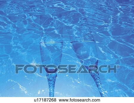 Stock Photo - Two glasses reflected on water surface, computer graphic. Fotosearch
