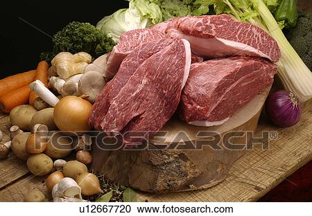 Vegetables and beef chops, black background View Large Photo Image Stock Image - Vegetables and beef chops, black background. Fotosearch