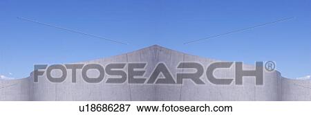 Stock Photo - Wall against blue sky. Fotosearch