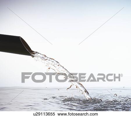 Stock Photography - Water coming out of bamboo. Fotosearch