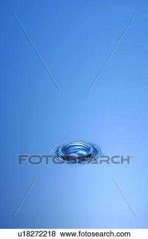 Stock Photo - Water drop hitting surface. Fotosearch