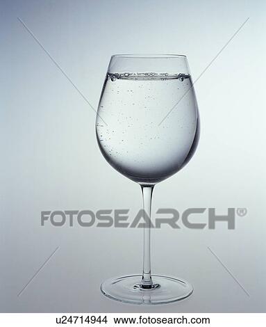 Picture - Water in wineglass. Fotosearch