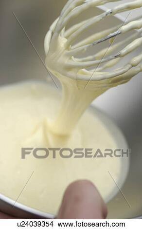 Whipped cream on whisk, close up View Large Photo Image Picture - Whipped cream on whisk, close up. Fotosearch