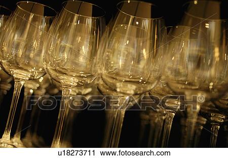 Stock Image - Wineglasses, black background. Fotosearch