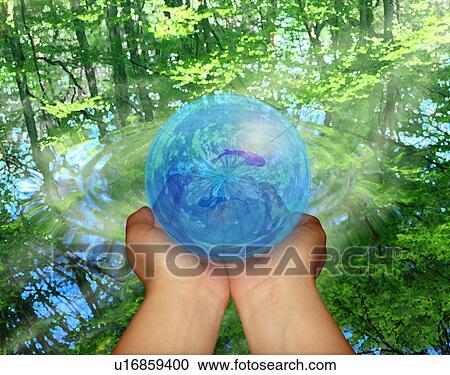 Stock Image - Woman holding globe in hands. Fotosearch