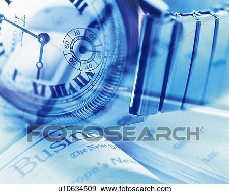 Stock Photo - Wristwatch on newspaper, close up, toned image. Fotosearch