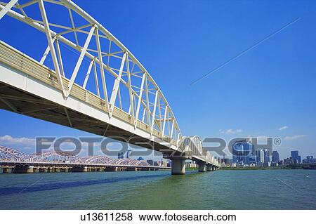 Yodogawa river and office buildings in Umeda, Osaka city, Osaka prefecture, Japan View Large Photo Image Stock Photo - Yodogawa river and office buildings in Umeda, Osaka city, Osaka prefecture, Japan. Fotosearch