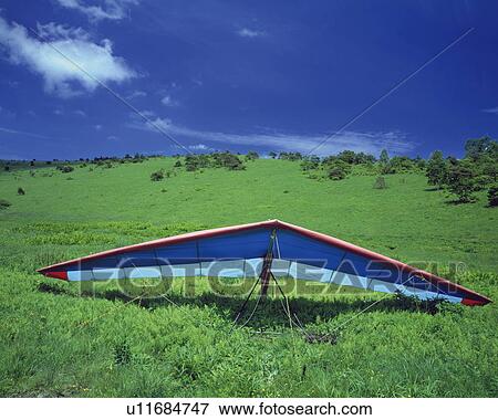 Hang glider in a field in Kirigamine, Nagano Prefecture, Japan View Large Photo Image Stock Photo - Hang glider in a field in Kirigamine, Nagano Prefecture, Japan. Fotosearch