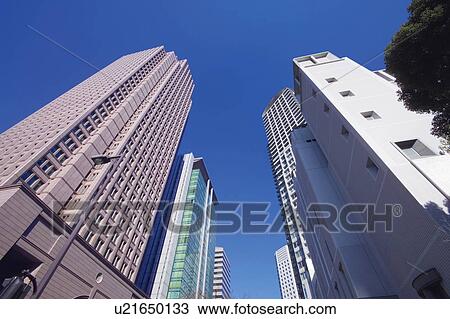 Low angle views of skyscrapers in West Umeda, Kita-Ku, Osaka, Japan View Large Photo Image Stock Image - Low angle views of skyscrapers in West Umeda, Kita-Ku, Osaka, Japan. Fotosearch