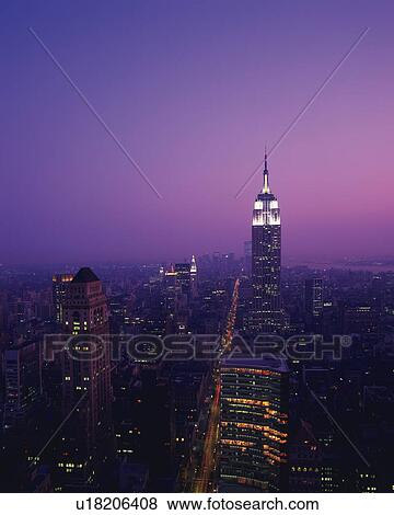 Night time cityscape of the Empire State Building in New York City, USA View Large Photo Image Stock Photo - Night time cityscape of the Empire State Building in New York City, USA. Fotosearch