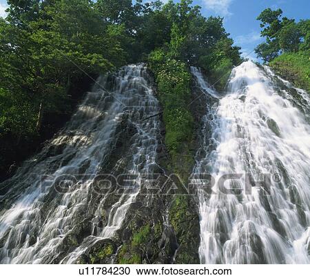 Stock Image - Oshin-Koshin Falls, Shari-machi, Hokkaido, Japan. Fotosearch