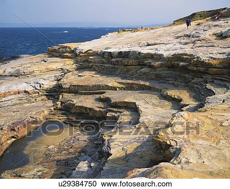 Stock Image - Rock formations by the sea, Senjojiki, Shirahama-machi, Wakayama Prefecture, Japan. Fotosearch