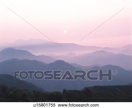 Silhouetted mountain range at sunset View Large Photo Image Stock Photography - Silhouetted mountain range at sunset. Fotosearch