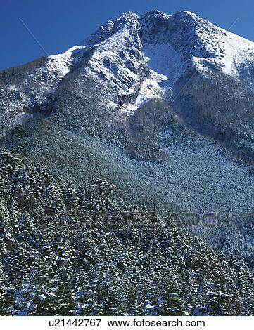 Snow-covered mountain View Large Photo Image Stock Photo - Snow-covered mountain. Fotosearch