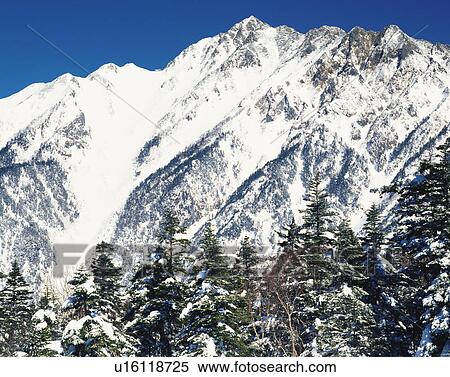 Stock Photography - Snow-covered mountain. Fotosearch