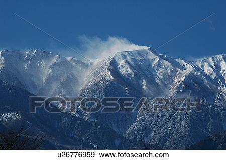 Stock Photo - Snow-covered mountains in Azumino, Nagano Prefecture, Japan. Fotosearch