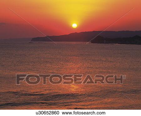 Sun setting over Yawata cape, Chiba Prefecture, Japan View Large Photo Image Stock Image - Sun setting over Yawata cape, Chiba Prefecture, Japan. Fotosearch