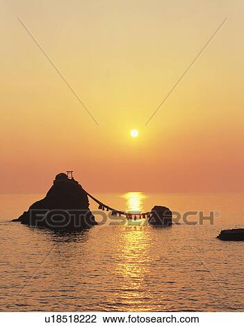 Sunrise over sea and silhouetted rocks, Mie Prefecture, Japan View Large Photo Image Stock Image - Sunrise over sea and silhouetted rocks, Mie Prefecture, Japan. Fotosearch