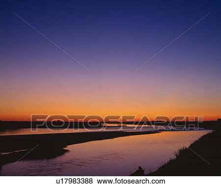 Sunset over the Mogami River, Sakata, Yamagata Prefecture, Japan View Large Photo Image Stock Photo - Sunset over the Mogami River, Sakata, Yamagata Prefecture, Japan. Fotosearch