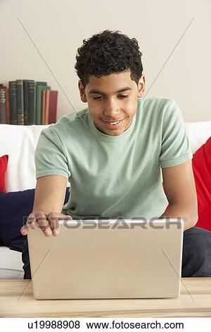 Boy Using Laptop View Large Photo Image Stock Photo - Boy Using Laptop. Fotosearch