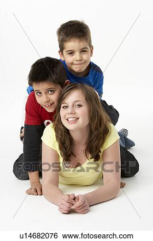 Brothers And Sister In Studio View Large Photo Image Stock Photograph - Brothers And Sister In Studio. Fotosearch