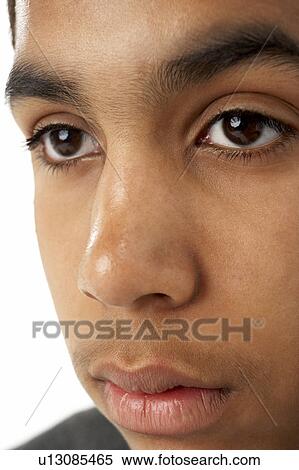 Stock Photography - Close-Up Of Young Boy's Face. Fotosearch