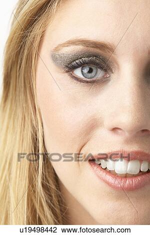 Close Up Of Young Woman Wearing Make Up View Large Photo Image Stock Image - Close Up Of Young Woman Wearing Make Up. Fotosearch