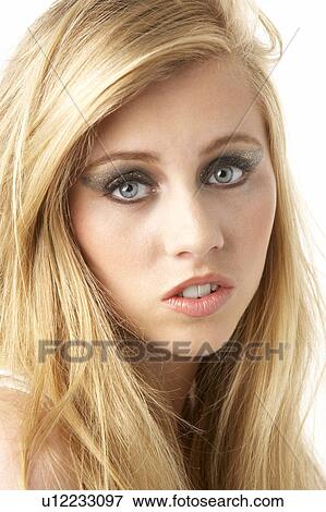 Stock Photo - Close Up Of Young Woman Wearing Make Up. Fotosearch
