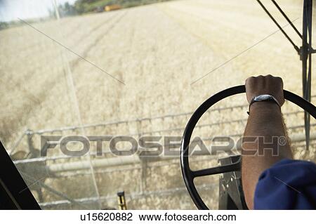 Combine Harvester Working In Field View Large Photo Image Stock Image - Combine Harvester Working In Field. Fotosearch