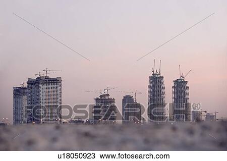 Stock Image - Construction Of Buildings In Dubai. Fotosearch