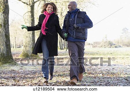 Couple On Autumn Walk View Large Photo Image Picture - Couple On Autumn Walk. Fotosearch