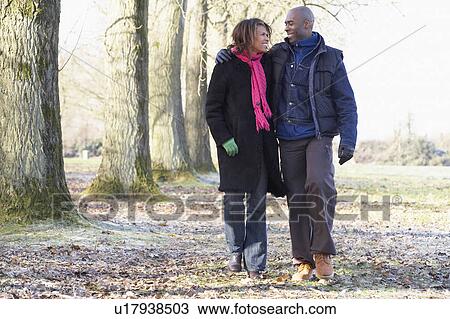 Couple On Autumn Walk View Large Photo Image Stock Image - Couple On Autumn Walk. Fotosearch