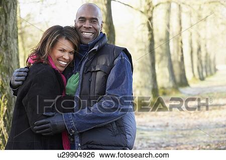 Couple On Autumn Walk View Large Photo Image Stock Photograph - Couple On Autumn Walk. Fotosearch