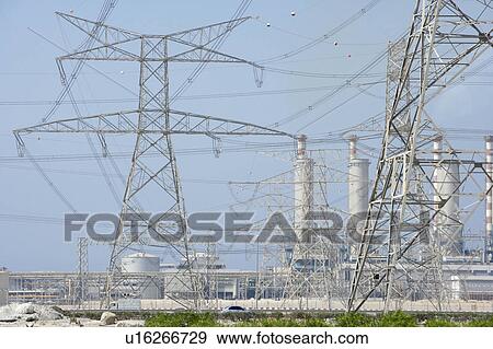 Electricity Pylons And Power Station View Large Photo Image Stock Photo - Electricity Pylons And Power Station. Fotosearch