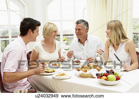 Family Group Enjoying Hotel Breakfast View Large Photo Image Stock Photo - Family Group Enjoying Hotel Breakfast. Fotosearch