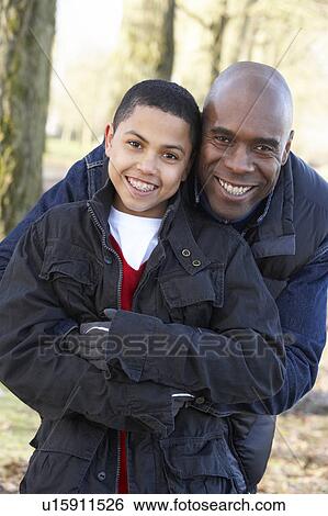 Father And Son On Autumn Walk View Large Photo Image Stock Photograph - Father And Son On Autumn Walk. Fotosearch