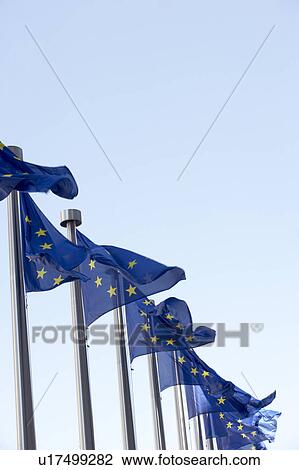 Stock Image - Flags Flying Outside European Commission Building. Fotosearch