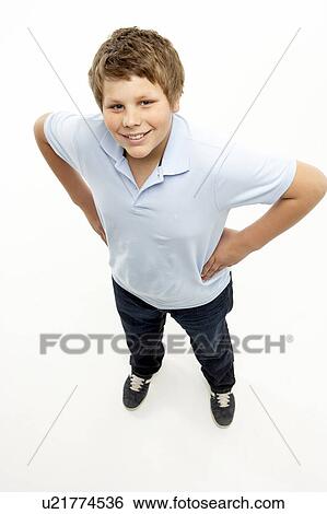 Stock Photograph - Full Length Portrait Of Young Boy. Fotosearch