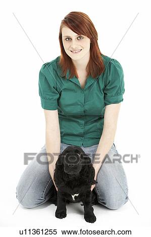 Girl With Black Spaniel Puppy View Large Photo Image Stock Photography - Girl With Black Spaniel Puppy. Fotosearch