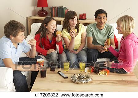 Group Of Children Eating Burgers At Home View Large Photo Image Stock Image - Group Of Children Eating Burgers At Home. Fotosearch