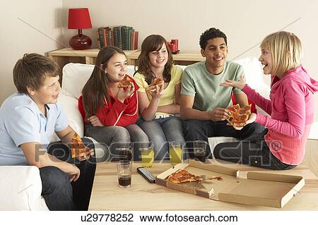 Group Of Children Eating Pizza At Home View Large Photo Image Stock Image - Group Of Children Eating Pizza At Home. Fotosearch