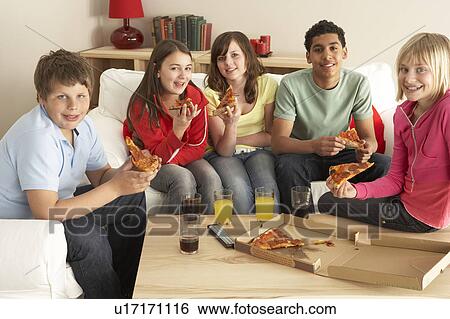 Group Of Children Eating Pizza At Home View Large Photo Image Stock Photograph - Group Of Children Eating Pizza At Home. Fotosearch