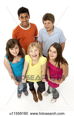 Stock Image - Group Of Five Young Children In Studio. Fotosearch